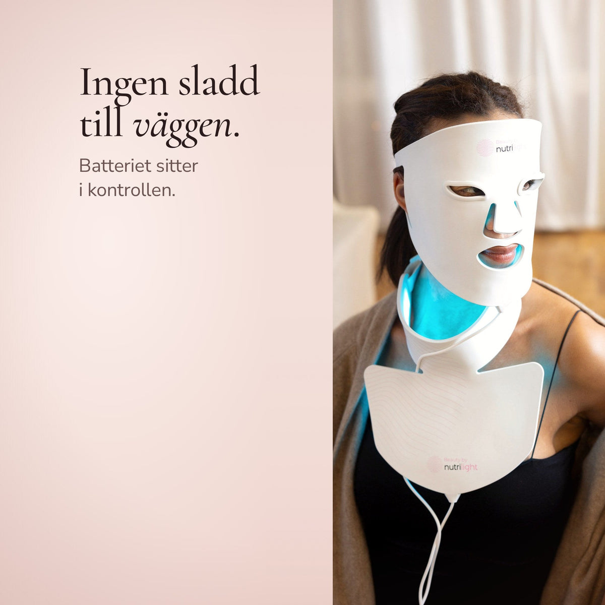 Kvinna bär The Lynx LED-mask med halsdel. Batteriet sitter i kontrollen, så ingen sladd går till väggen.
